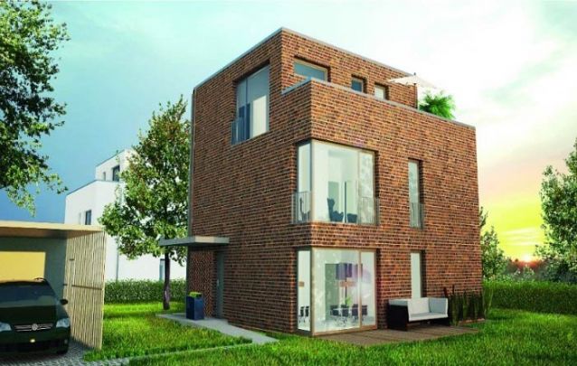 Que tal esta casa moderna de três andares feita com tijolos aparentes?