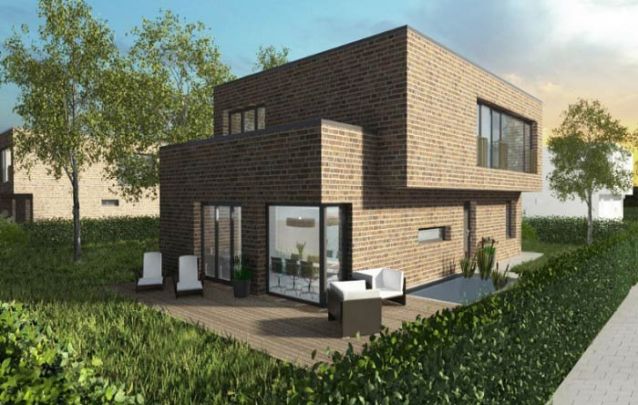 Uma casa moderna feita de tijolos aparentes trazem características do atual estilo industrial